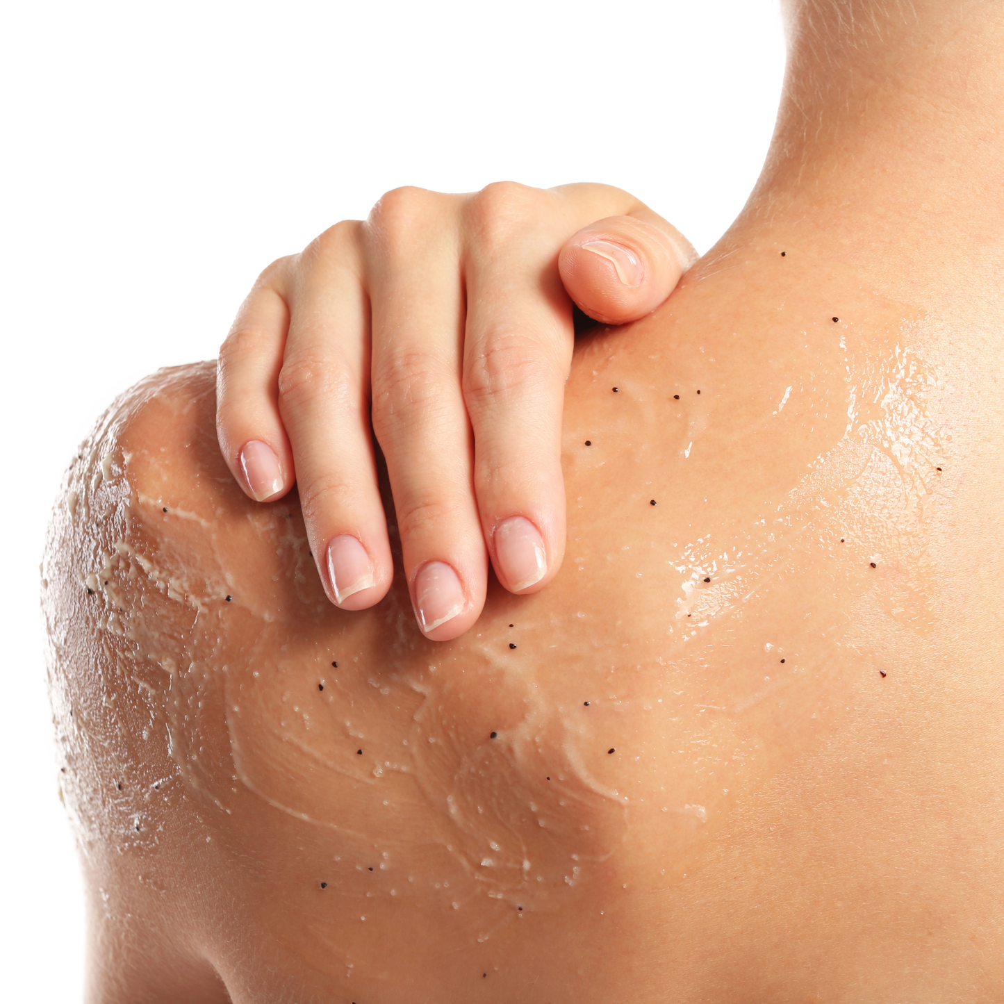 Close-up of a hand applying a skincare product to a shoulder with a white background