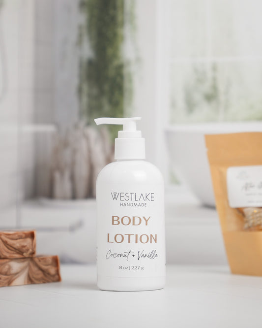 Westlake Handmade body lotion bottle on a blurred background with bath products.