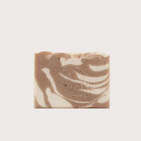Swirled brown and beige soap bar with 'Westlake Handmade' branding on a light gray background